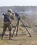 "A_soldier_with_the_Ukrainian_Land_Forces_fires_a_Degtyaryov-Shpagin_Large-Caliber_heavy_machine_gun.jpg" by User:Remitamine