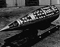 "Demonstration_cluster_bomb.jpg" by User:Martin H.
