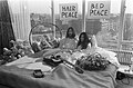 "John_Lennon_en_zijn_echtgenote_Yoko_Ono_op_huwelijksreis_in_Amsterdam._John_Lenn,_Bestanddeelnr_922-2302.jpg" by User:Mr.Nostalgic
